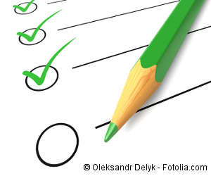 Checkliste mit grünem Stift