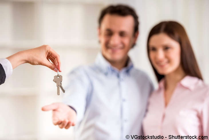 handing over of the keys to the new tenants